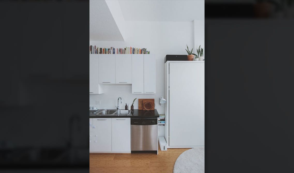 white kitchen with BookShelf for the Bookworm