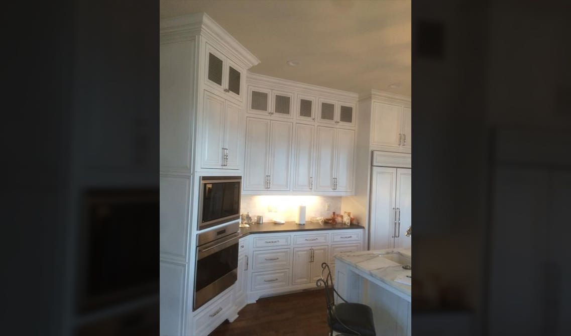 white kitchen cabinets with white kitchen island 