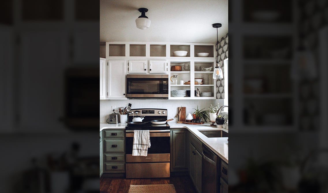 white kitchen design with cabinet galore 